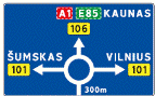 602 Išankstinė krypčių rodyklė (Eismo kryptys į kelio ženkle nurodytas gyvenvietes. Atstumas iki sankryžos nurodomas kelio ženklo apačioje)